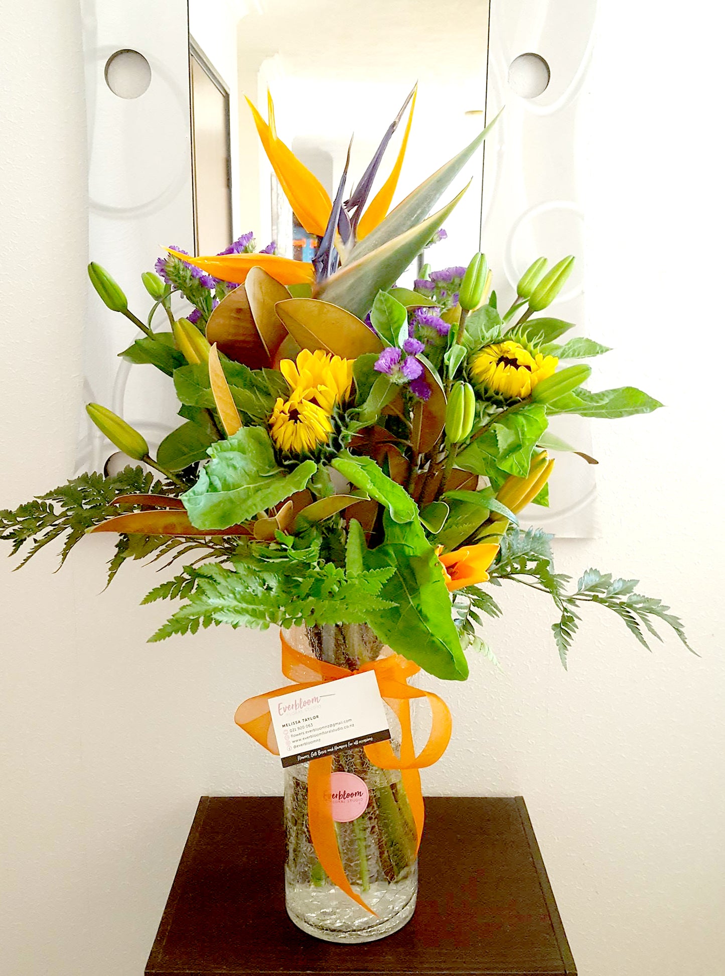 This is a beautiful semi tropical flower bouquet made with birds of paradise, lilies and sunflowers. A great display bouquet for any occasion. We offer same day flower delivery to mount maunganui, papamoa and Tauranga.