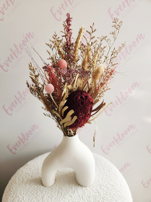 Dried flower arrangement in pink and natural tones in white vase. Great flower gift for any occasion. Everbloom floral studio, your local Tauranga florist