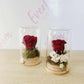 Red preserved rose in a glass dome from Everbloom Floral Studio.