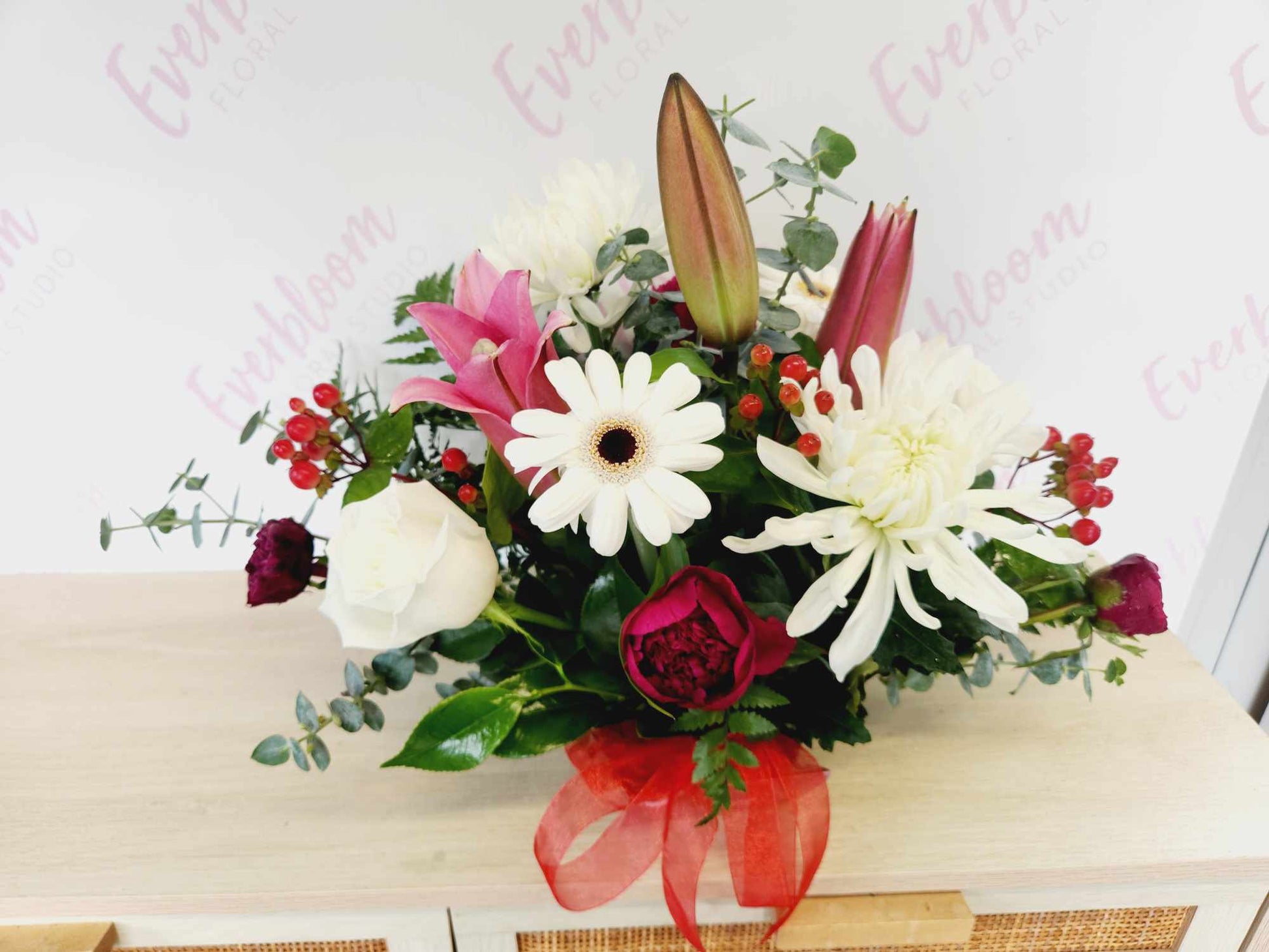 Christmas table arrangement - Red White and Green Made with mixed flowers and greenery.
Everbloom Floral Studio - Local Mount Maunganui and Papamoa Florist