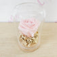 Pink preserved rose in glass dome from Everbloom Floral Studio