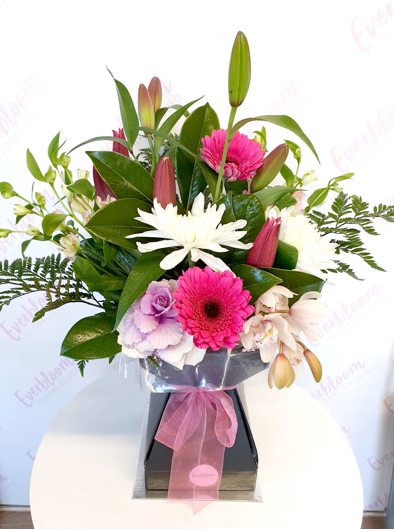 Our Vox box is a fresh flower arrangement in a re-usable cardboard vase with liner. Vox boxes are a popular choice for sympathy flowers, offices, hospitals and apartments where no vase is needed. Simply display and enjoy with no fuss. Everbloom floral studio is your local friendly Mount Maunganui and Papamoa florist offering a same day delivery service.